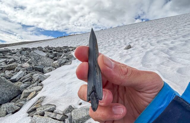 Approximately 5,000-year-old slate arrowhead found beside melting mountain ice in Jotunheimen, Norway