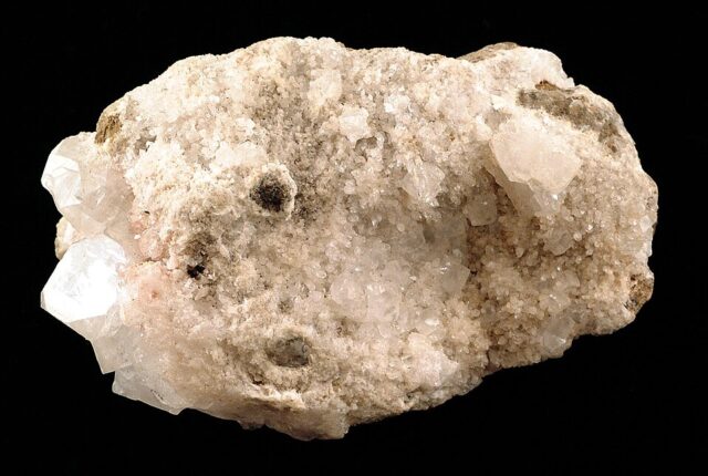 Natural apophyllite crystal specimen with transparent prismatic crystals