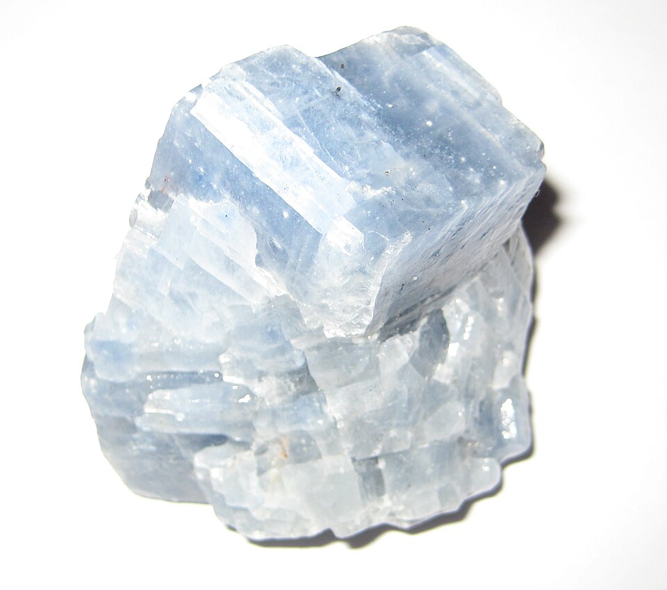 Natural blue calcite mineral specimen showing pale blue crystalline surfaces