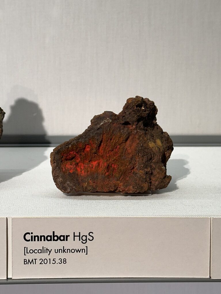Red cinnabar mercury sulfide mineral specimen at the Lapworth Museum of Geology