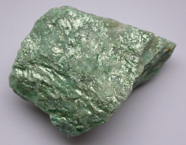 Natural green chromium-rich fuchsite mica mineral specimen, fuchsite stone meaning and properties