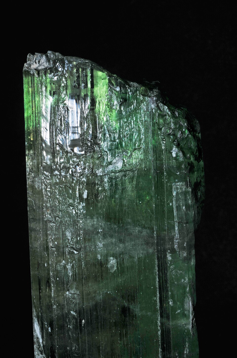 Natural hiddenite green spodumene crystal from Paprok Mine, Afghanistan