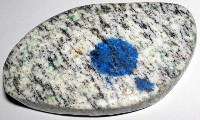 K2 Stone granite with vivid blue azurite orbs from the mountains of Pakistan