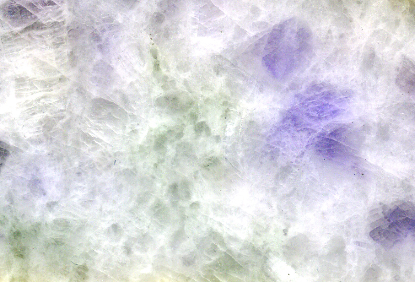 Natural lavender jadeite jade from Myanmar showing pale purple and white mineral pattern