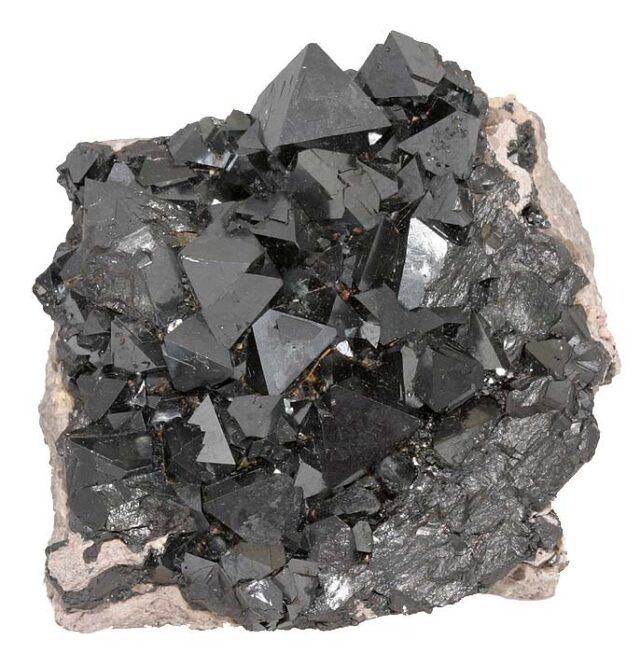 Natural black metallic magnetite octahedral crystals from Cerro Huanaquino Bolivia