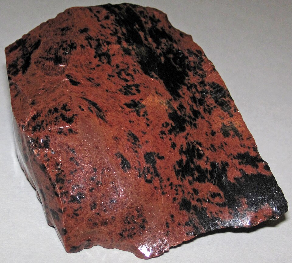 Natural brown and black mahogany obsidian volcanic glass from Glass Buttes Oregon