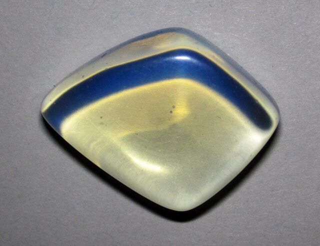 Man-made opalite opalescent glass gemstone with milky translucent appearance