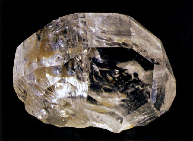 Natural phenakite (phenacite) beryllium silicate mineral crystal specimen