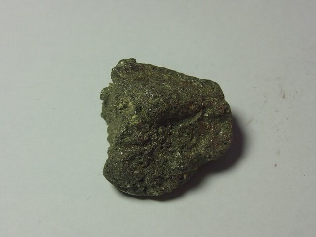 Natural metallic golden pyrite mineral sample showing iron sulfide crystal faces