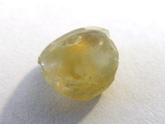 Natural rough yellow sapphire gemstone found at Spokane Bar sapphire mine in Montana